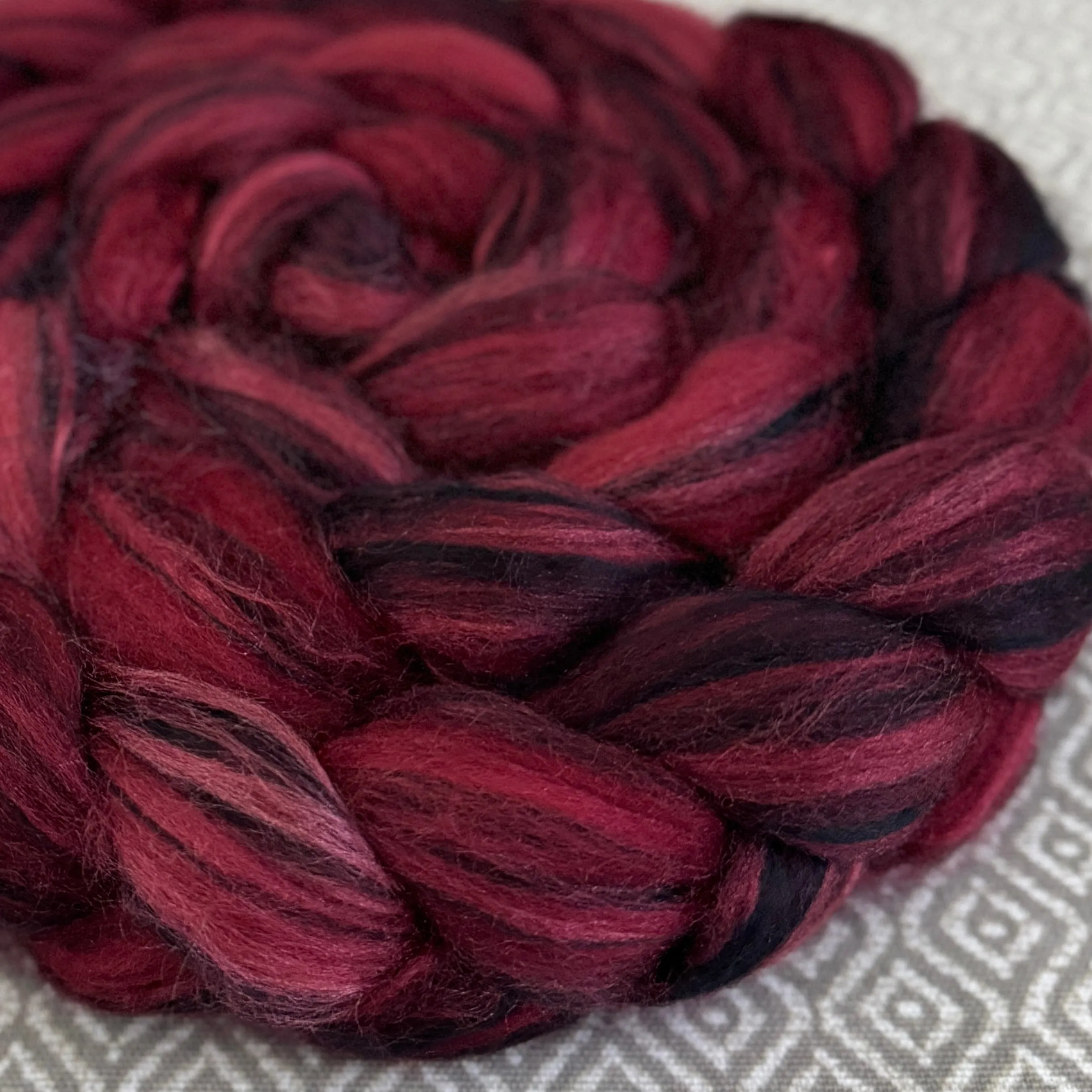 Polwarth Black Bamboo Silk Roving - Red 481 - OOAK