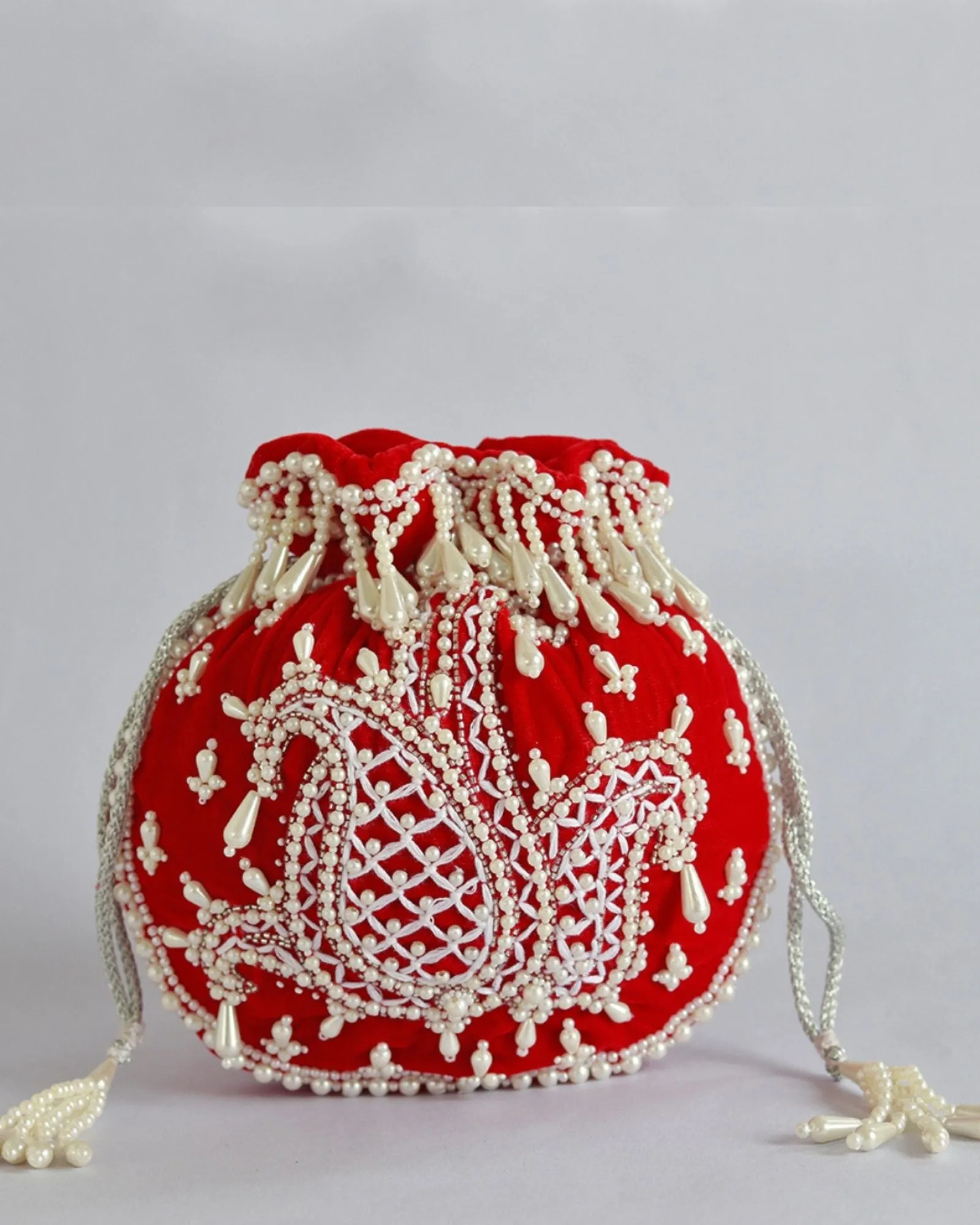 Sukoon Hand Embroidered Potli with Pearl Handle