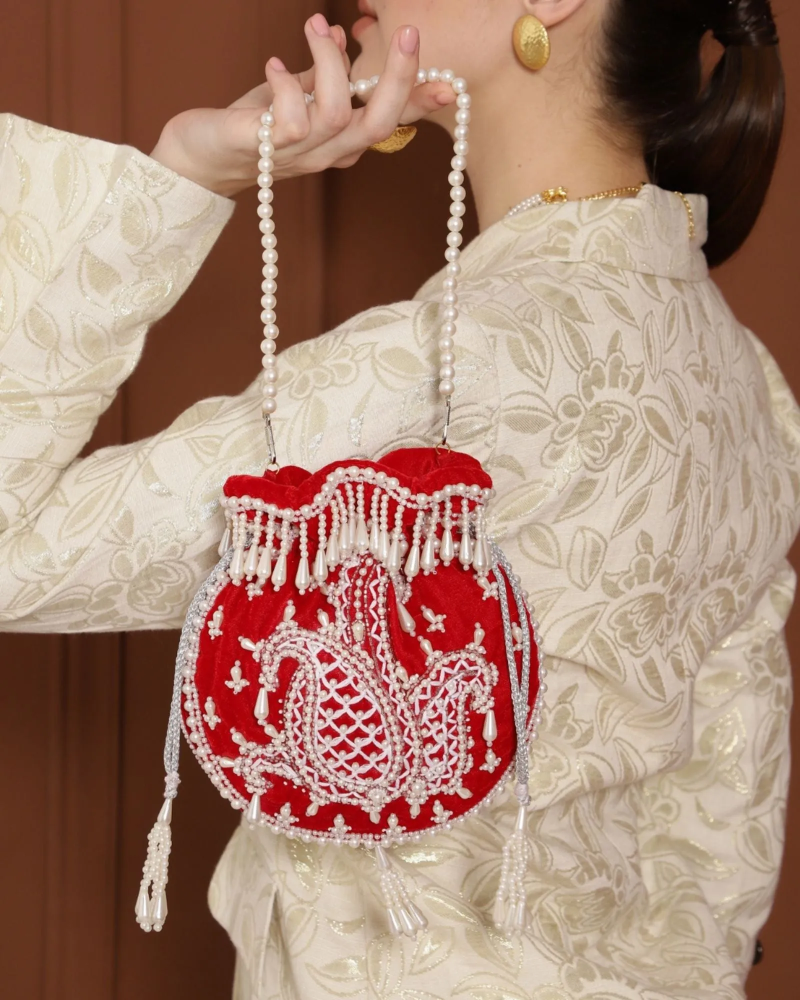 Sukoon Hand Embroidered Potli with Pearl Handle