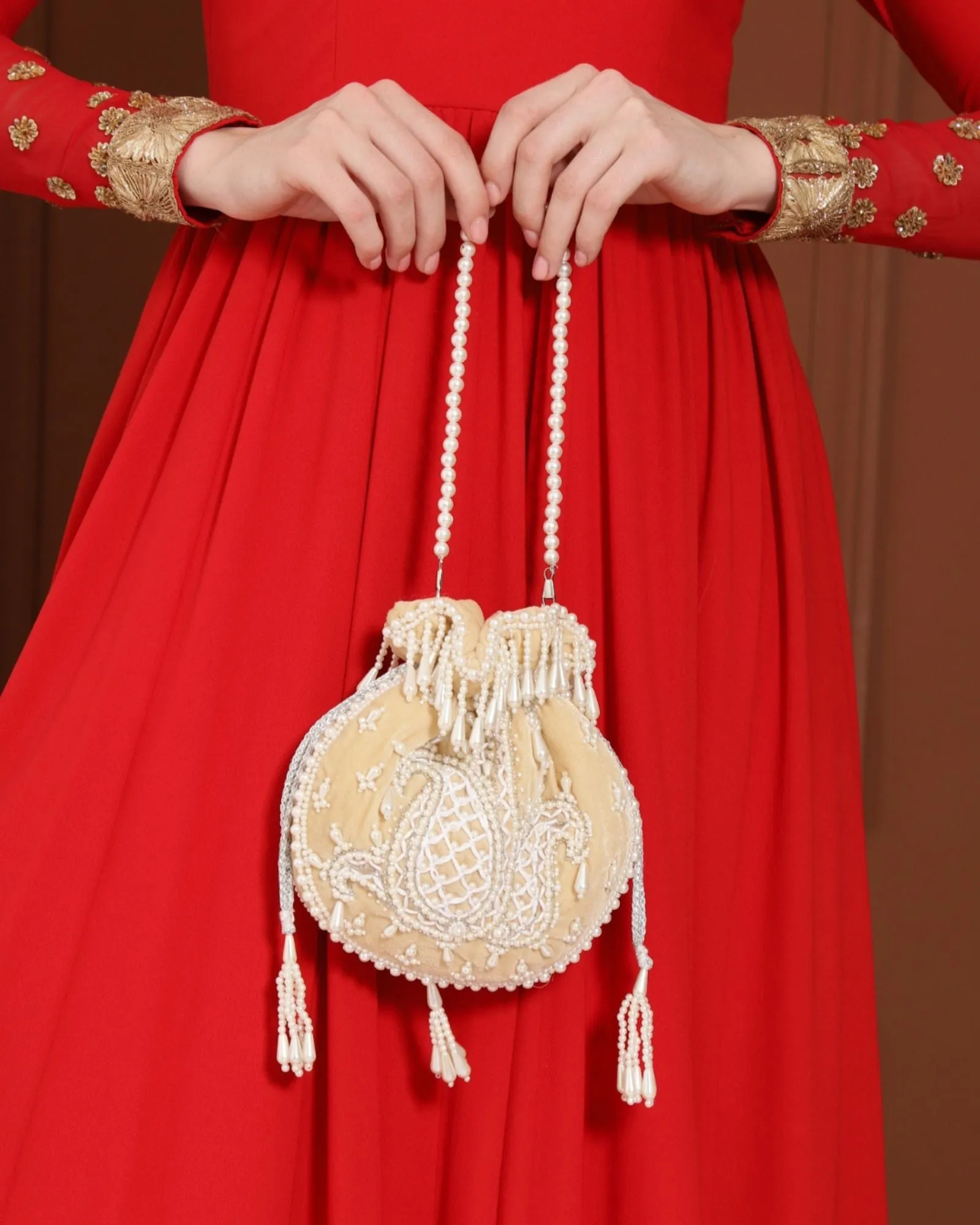 Sukoon Hand Embroidered Potli with Pearl Handle