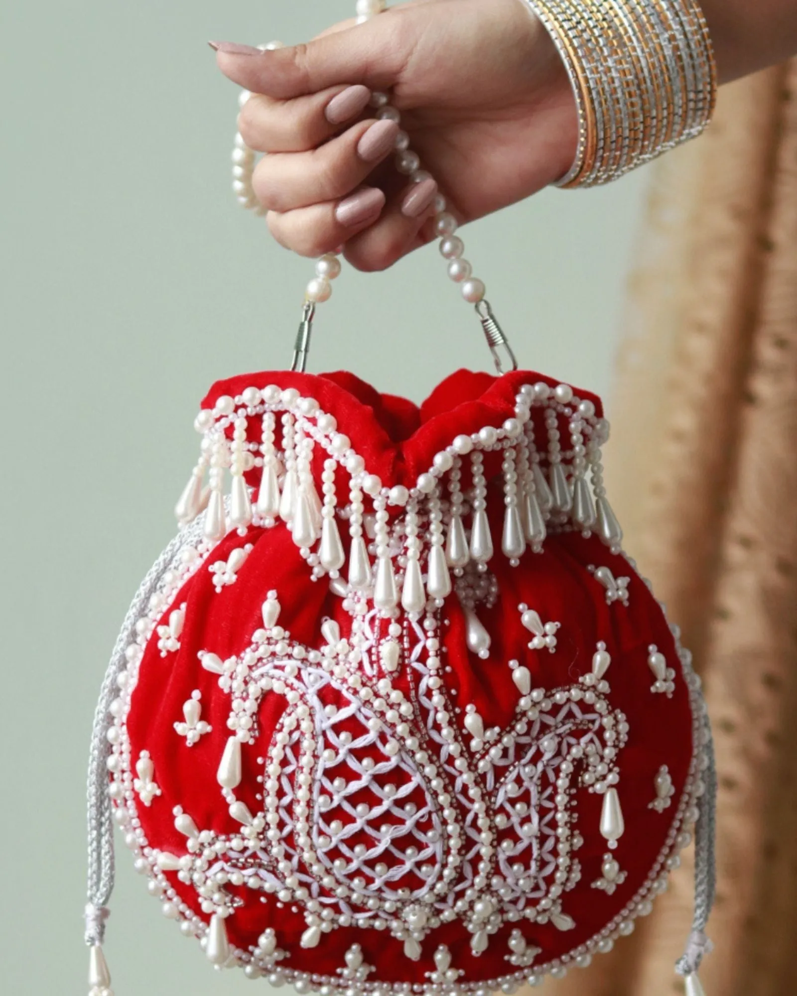 Sukoon Hand Embroidered Potli with Pearl Handle